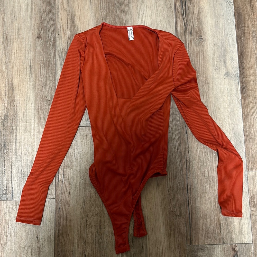 Free people bodysuit worn once!